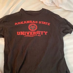 Arkansas State University t-shirt.